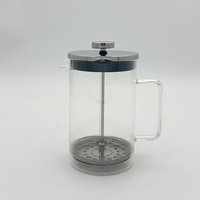 Cafetière à piston en verre borosilicate avec finition polie en acier inoxydable, design contemporain et écologique