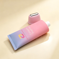 Tube cosmétique vide en PE avec impression de logo personnalisé, tête de massage en aluminium pour l'emballage de crème de soin corporel