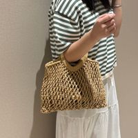 Sac à main vintage en crochet ajouré de luxe pour femme, sac de plage et de shopping en macramé fait main tendance pour l'été avec poignée en bois en forme de cœur