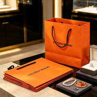 Emballages de bijoux de haute qualité pour boutiques, sacs cadeaux personnalisés pour bracelets, boucles d'oreilles, colliers, bagues, sacs en papier parfumé orange