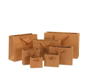 Poignée de ruban de luxe Boutique Shopping Emballage Impression personnalisée sac en papier cadeau commercial recyclé petit sac en papier au détail