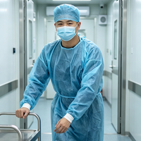 Blouse d'isolement médicale anti-pénétration personnalisée en PP 35g avec fermeture auto-agrippante, résistante aux éclaboussures, non tissée, vente en gros, export