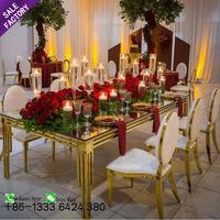 Venta caliente decoración muebles conjunto Hotel espejo de acero inoxidable boda mesa de cristal superior pastel exhibición para fiesta