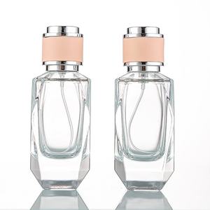 Venta al por mayor de frascos de perfume de 100 ml, botellas de vidrio transparente para perfume, botellas con atomizador, botellas de vidrio con borde cortado, botellas vacías. - Product Image 1