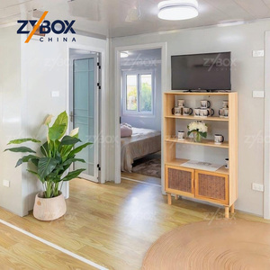 <span class=keywords><strong>Maison</strong></span> conteneur modulaire préfabriquée extensible surélevée de 40 pieds, finition <span class=keywords><strong>bois</strong></span> foncé, pour villa forestière, complexe hôtelier et glamping - Product Image 3