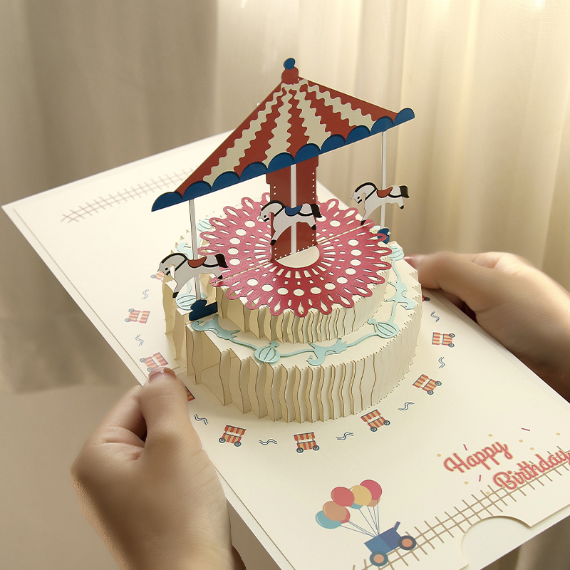 Rotating carousel style, comes with 1 envelope