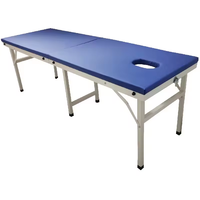 La table de massage pliable portable avec six pieds est plus stable et plus porteuse