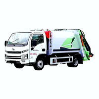 Camion poubelle à benne suspendue à compression