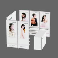 Système de présentation SEG pour salons professionnels : Sacs et accessoires pour stands, solution d'affichage pour vêtements pour enfants