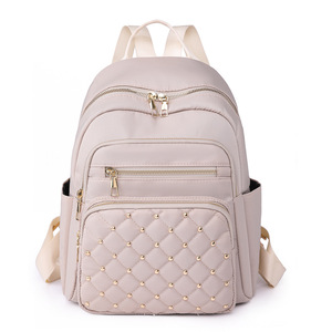 Mochila minimalista de lunares de Color sólido a la moda europea y americana de gran capacidad para mujer, mochila con remaches de diamantes, 2024 - Product Image 5