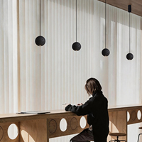 Lustre moderne minimaliste de style industriel pour chambre et salle à manger, avec éclairage intégré en pierre noire