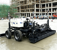 Niveleuse à béton laser robuste avec structure antichoc pour les travaux de construction de sols en béton dans les ports et entrepôts