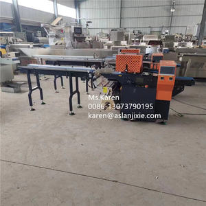 Máquina empacadora automática de tipo almohada de caramelo de leche Galletas Cuchara Máquina empacadora de flujo de miel - Product Image 4