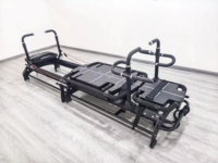 Contrôle de mouvement avancé de qualité en alliage d'aluminium noir Studio Gym Logo personnalisé Core Machine Pilates Reformer