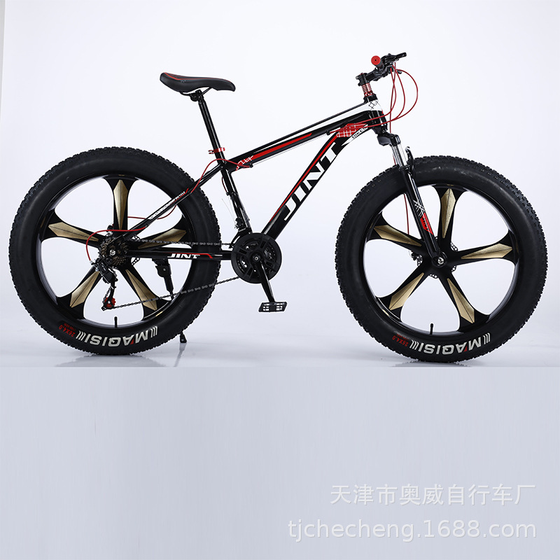 Bicicleta de nieve roja de 26 pulgadas, 27 velocidades y llanta de 5 radios.