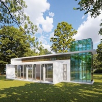 Maison préfabriquée personnalisée haut de gamme combinée de luxe-équipée d'une véranda pour la lumière naturelle
