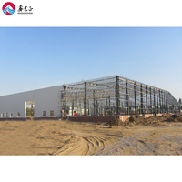 Offre Spéciale préfabriqué cadre en acier Construction Sandwich Bardage Entrepôt Garage Ateliers et usines