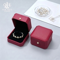 Boîte à bijoux octogonale avec doublure en velours et design élégant pour bagues, bracelets et colliers