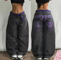 Jeans en denim gris foncé délavé à jambe large pour femme, style vintage, avec imprimé tête de mort gothique sur la poche arrière, vente en gros