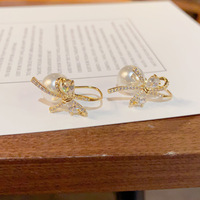 Boucles d'oreilles pendantes en cuivre avec nœud Resoul, bijoux fantaisie pour femme, accessoires de fête en zircon