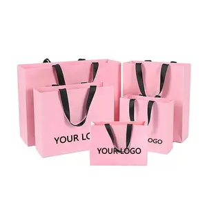 Wholesale Supplier Customized Printed Design Luxury Gift Shopping Embossing Pink Paper Bag with Brand Logo