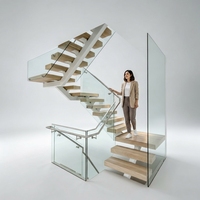 Escalier flottant moderne minimaliste en verre et métal pour villa résidentielle, design personnalisé