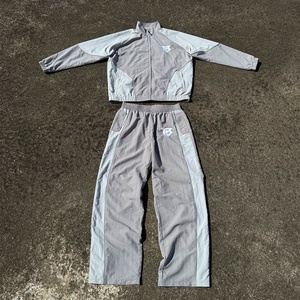 Custom Polyester Men Jogger Set Two Piece Patchwork Zip up Jacket and Nylon Track <b>Pants</b> Set Windbreaker Nylon Tracksuit - Product Image 1