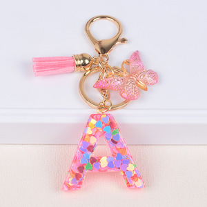 Llavero de resina con letras, colgante de mariposa y confeti de corazón colorido, borla rosa, adorno para bolso, regalo - Product Image 1