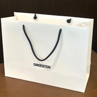 Maßgefertigte Umweltfreundliche Luxus-Papiertüte mit UV-Logo-Laminierung aus Recyclingmaterialien für Boutique-Verpackungen