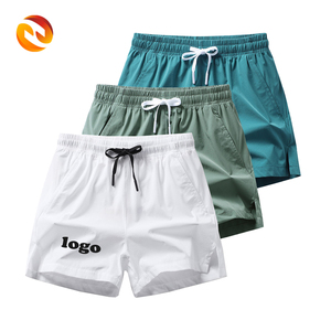 Short de gym écologique d'été personnalisé pour hommes Short de bain extensible anti-rides avec maillot de bain numérique à impression solide - Product Image 1