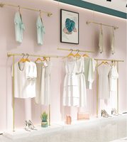 Présentoir de magasin de boutique en acier inoxydable avec porte-vêtements en or Porte-vêtements d'occasion pour la vente de centre commercial