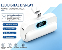 Produk Tren 2026 Power Bank Terlaris 5000mAh Mini Capsule 20W Pengisian Cepat USB Layar LED Plug 2-in-1 Portabel OEM