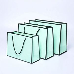 Sacs en papier de luxe personnalisés avec cordon de serrage, recyclables, prix d'usine KM Chine, avec logo pour vêtements - Product Image 2