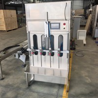 Remplisseuse semi-automatique par gravité 120 kg de poids net, structure compacte, installation facile pour huile comestible, sauce soja