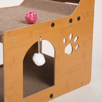 Fauteuil de grattage pour chat YAOYUE à dossier haut avec surfaces en carton ondulé et cabine en arche 60 cm Fabriqué en Chine