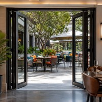 Porte pliante en aluminium extrudé insonorisée et étanche de style français sur mesure pour salon, design pliable