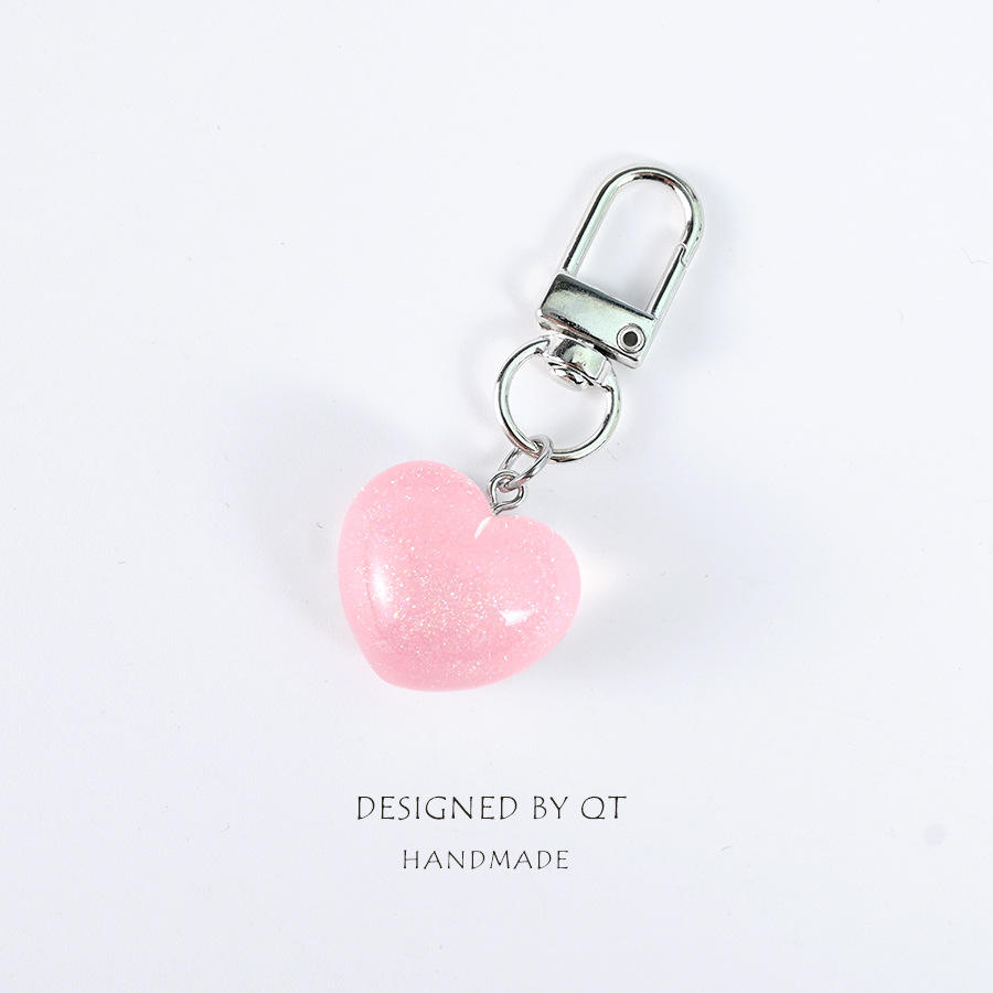 พวงกุญแจเรซิ่นรูปหัวใจสีชมพูอ่อน