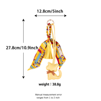 Breloque de sac chat OEM&ODM, pendentif chat en cuir avec nœud et pompon en soie pour sac à main, accessoire de décoration quotidienne à suspendre sur l'extérieur du sac