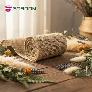 Rubans Gordon en gros, rubans en <span class=keywords><strong>jute</strong></span> naturelle avec fil métallique <span class=keywords><strong>de</strong></span> 6 cm, rouleaux <span class=keywords><strong>de</strong></span> rubans en <span class=keywords><strong>toile</strong></span> <span class=keywords><strong>de</strong></span> <span class=keywords><strong>jute</strong></span>, rubans pour sacs en <span class=keywords><strong>jute</strong></span>, magnifiques rubans en <span class=keywords><strong>jute</strong></span> pour emballages cadeaux - Product Image 1