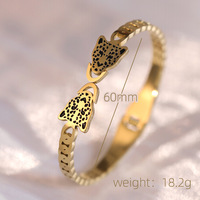 Vente de gros Bracelets haut de gamme en acier inoxydable à double tête de léopard incrustés de diamants en or 18 carats