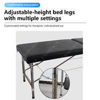 Chaise de massage professionnelle Union Win avec cadre noir, dossier réglable, surmatelas intégré et extension de table pour salon de beauté