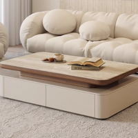 Table basse de style vintage en noyer avec plateau en travertin, idéale pour les petits appartements, design simple et moderne.