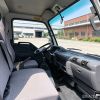 Camion plateau diesel Isuzu NHR 4X2 d'occasion, options conduite à gauche/droite, boîte de vitesses manuelle pour le transport de marchandises et de matériaux de construction
