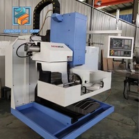 Fraiseuse CNC verticale haute précision XK7126 12 axes avec commande KND, capacité moyenne pour le fraisage de pièces métalliques