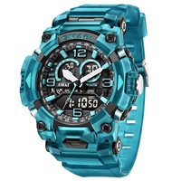 Montre sport à quartz pour homme SMAEL 8099 avec affichage numérique, boîtier rond, cadran de 52 mm, chronomètre, alarme et résistance à l'eau 5 BAR