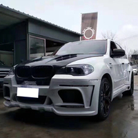 Kit carrosserie style Harman pour BMW X5 E70 (2006-2013) : pare-chocs avant, ailes, jupes latérales et pare-chocs arrière