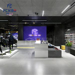 Exhibidor de Ropa Deportiva con Tecnología Personalizada PENBO, Estante con Iluminación LED, Decoración Interior Moderna para Tienda Deportiva, Madera/Metal/Cristal - Product Image 2