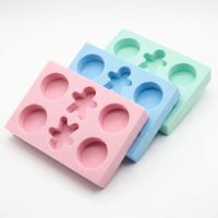 Insert en mousse de velours multicolore personnalisé pour présentoir de parfumerie