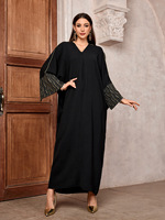 Abaya de luxe noire de Dubaï avec détails de manches dorées Modish Loose Fit Silhouette Khaleeji Minimalist Dress