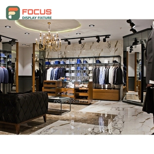 Exhibidor de Piso de Acero Inoxidable Resistente para Comercios, Diseño Interior Comercial para Tiendas de Ropa - Product Image 1